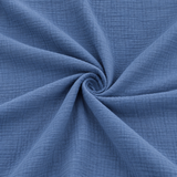 Double-gaze 100% coton bleu orage plissée en spirale, gros plan sur la texture du tissu